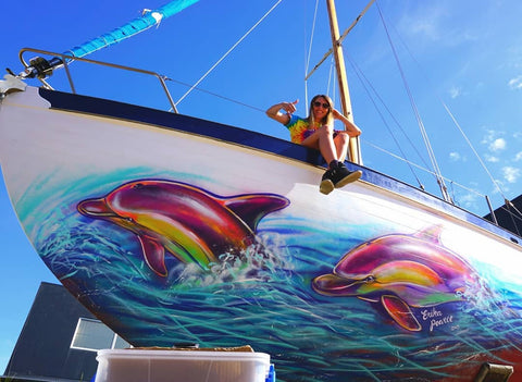 Erika Pearce street art mural dolphin boat
