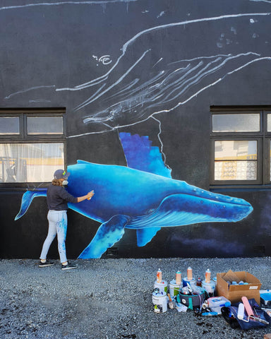 Erika Pearce street art mural in Riverton New Zealand, baby whale in progress