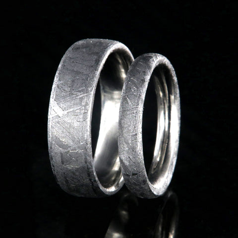 Matching meteorite rings set on side