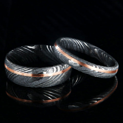 White Damascus steel wedding band set with copper inlay