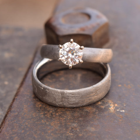 Meteorite engagement ring with moissanite stone and meteorite wedding band