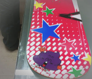 Vinilo personalizado a tabla de snowboard