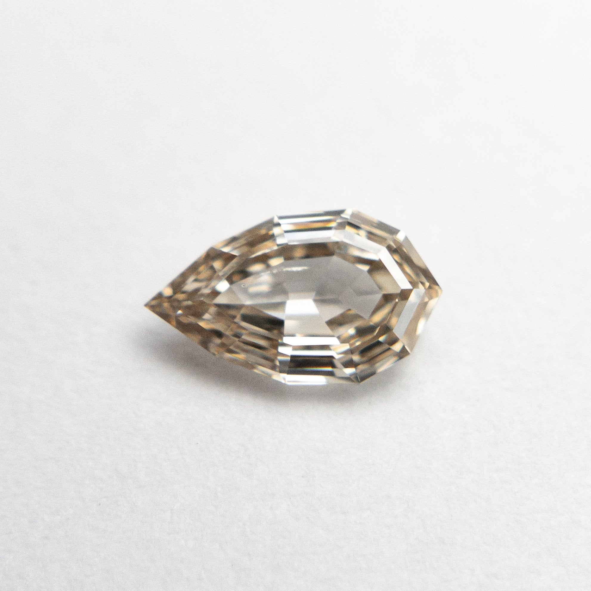 0.30ct 6.21x3.65x1.86mm Geo Pear Step Cut 19163-26