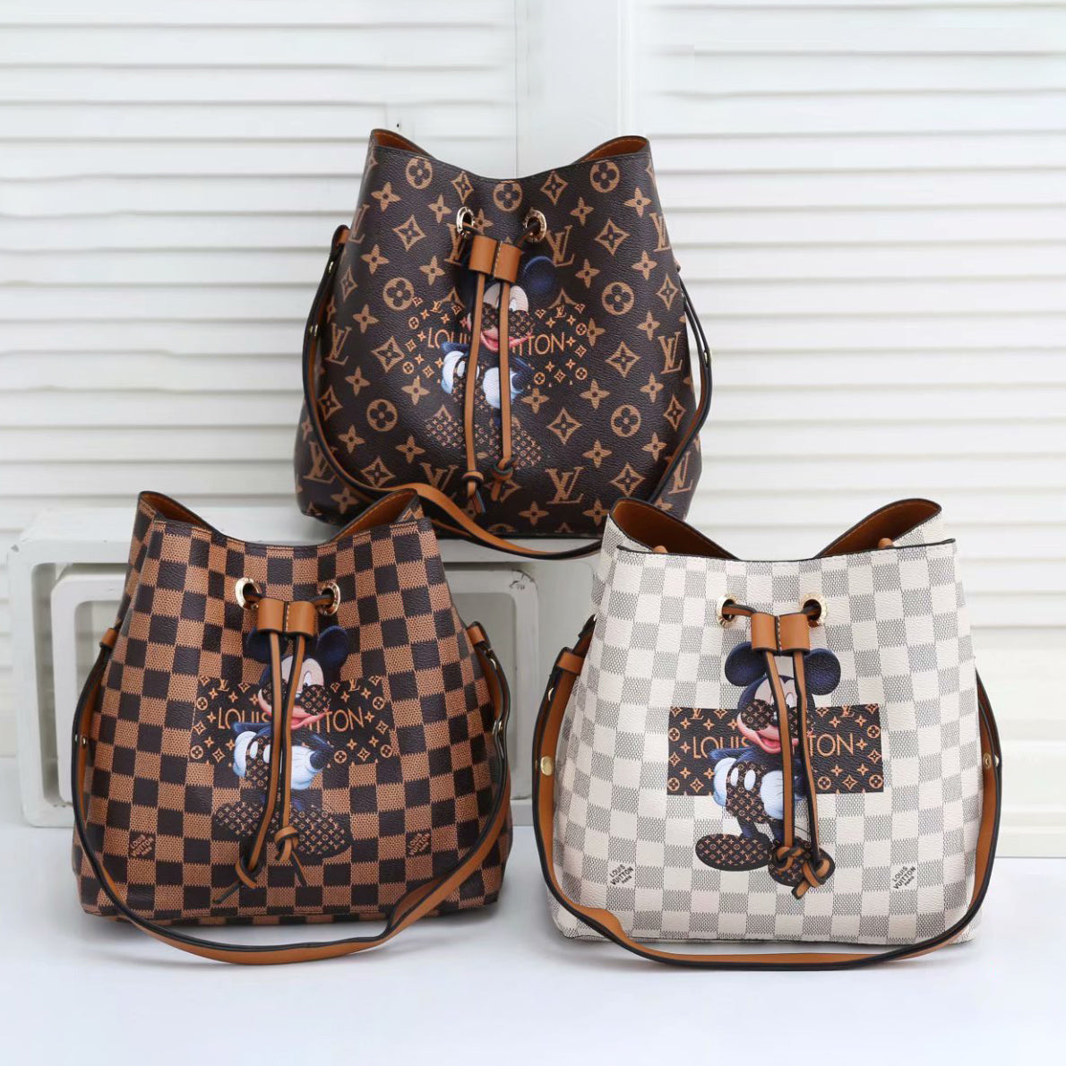 Louis Vuitton LV new cartoon cute Mickey Mouse wild one-shoulder messenger bucket bag