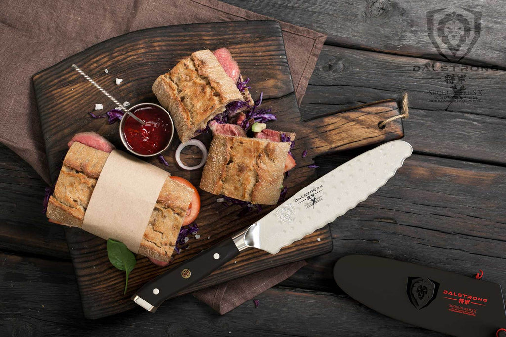 Utility knife on cutting board with sandwich