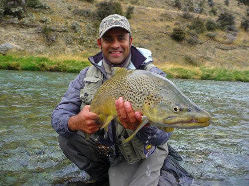 Rob vaz, trophy brown trout, fishing a mouse fly, mouse feeding trout, new zealand back country fishing south island NZ, guides, streamer pattern, dore's Mr Glister, big fish