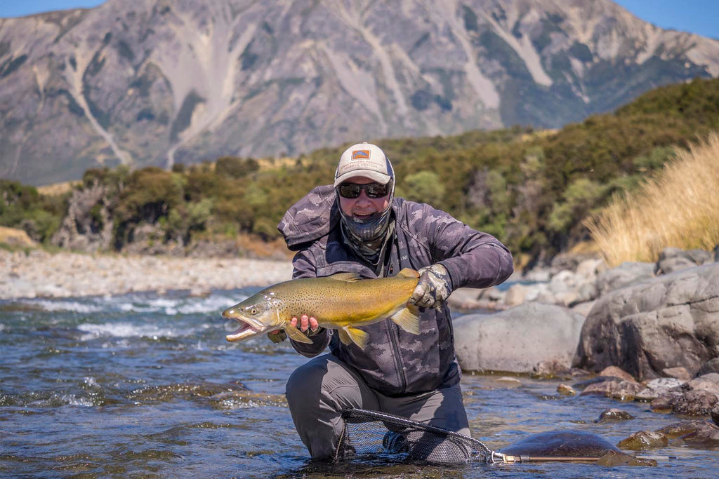 Andrew Harding holds a perfect south island NZ brown trout