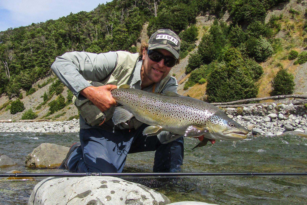 Adam Priest Fly Fishing Guide With A Trophy Brown Trout