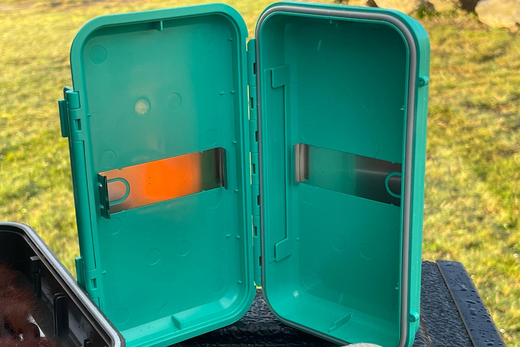 A green C&F design fly box