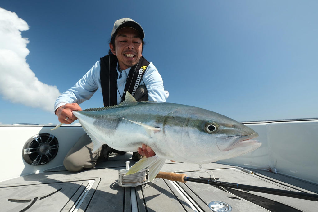 Yoshi From North Shore Hunting & Fishing With A Kingfish Caught On Fly