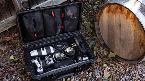 Top down image of fully loaded 300 camera case with lid organizer and padded divider.