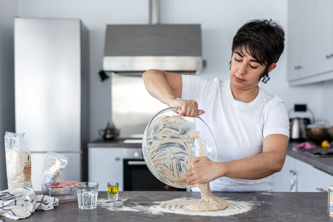 Leila is showing the audience the dough making process