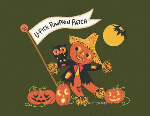 scarecrow with an owl on its shoulder beside a banner that reads "U-Pick Pumpkin Patch". Glowing jack o lanterns at its feet