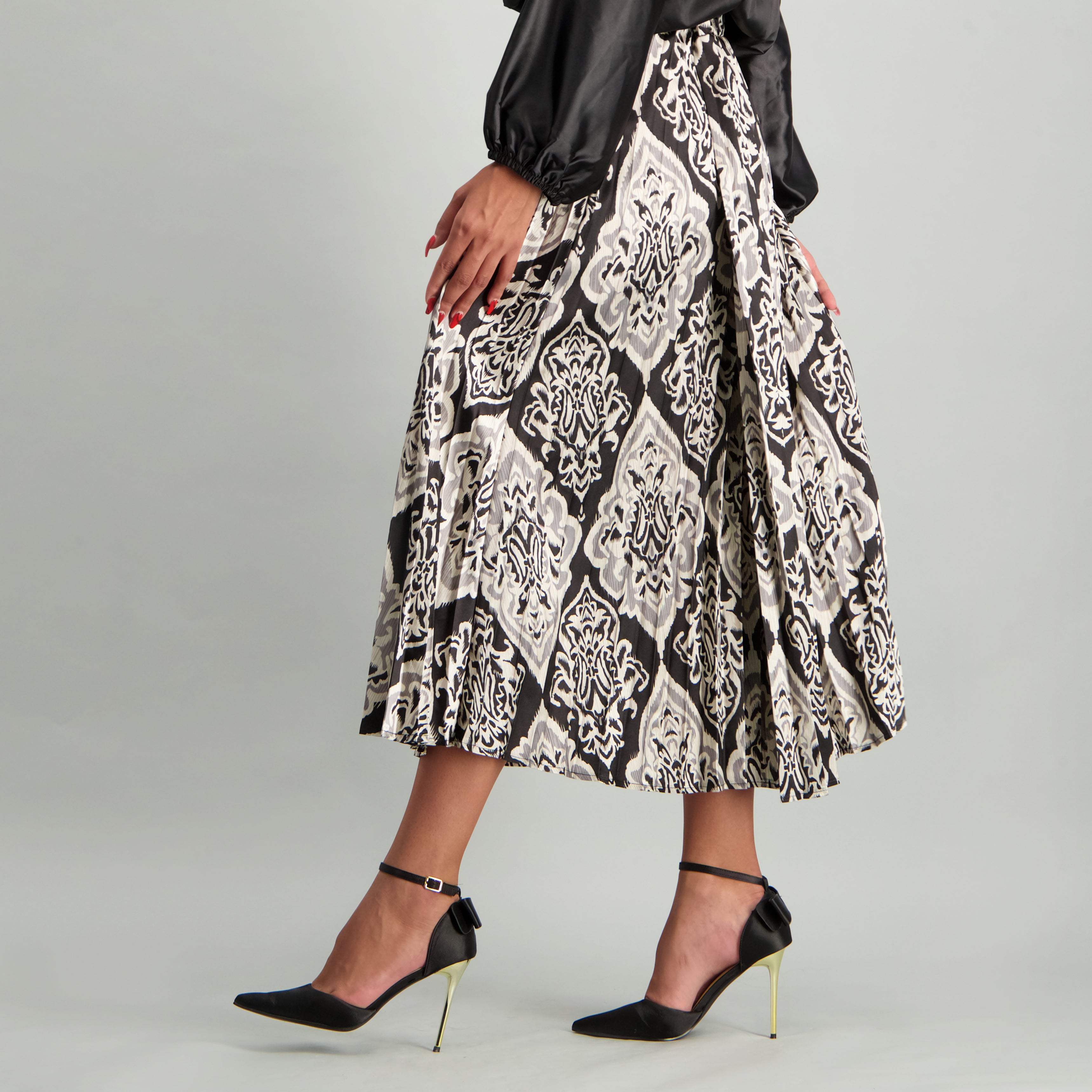 CREAM PRINTED LONG PLEATED SATIN SKIRT - Fashion Fusion 229.99 Fashion Fusion