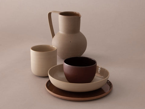 tableware collection: ceramic plates, bowls, mug and pitcher