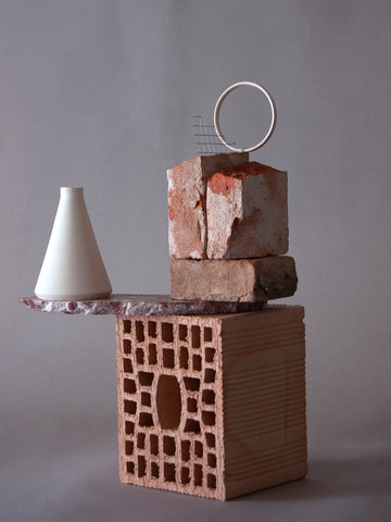 sculpture with ceramic vases, bricks and debris from construction site s