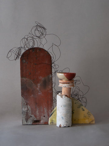 Sculpture with ceramic vases, bricks, debris from construction site