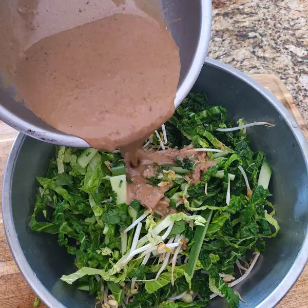 Tamarind Asian Salad - mix in the dressing