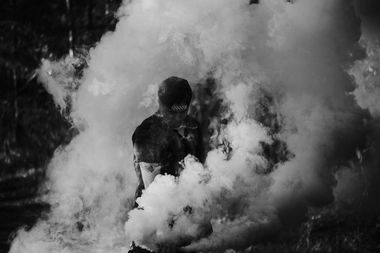 man in a cloud of smoke