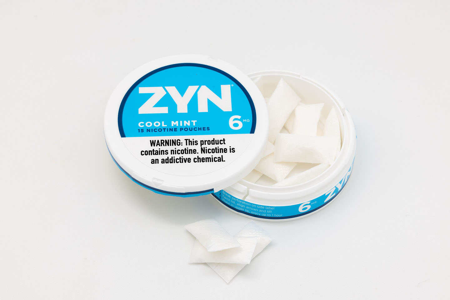 an open tin of ZYN nicotine pouches