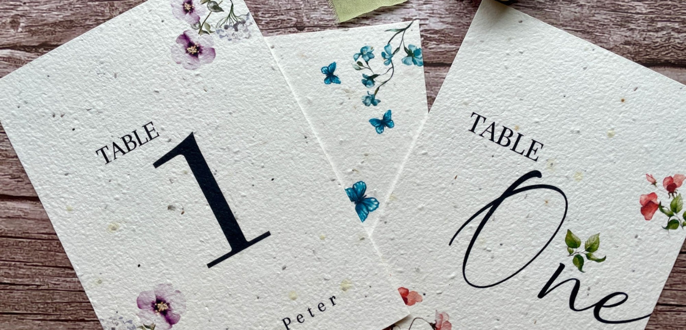 An example of the wedding stationery you may need on the day of your wedding, featuring A La KArt Creations table number cards.