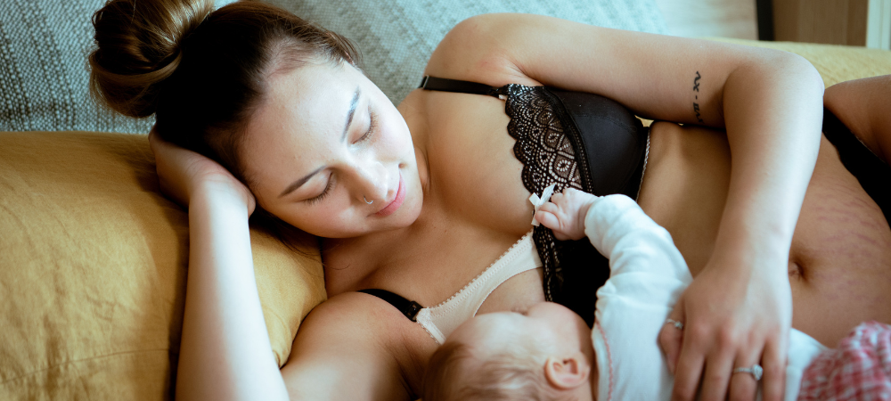 Breastfeeding mum wears a soft cup nursing bra by Hotmilk