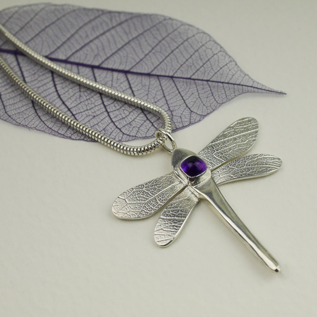 Sterling silver and amethyst dragonfly pendant, the completed piece from January's selected gemstone from the Envelope Project