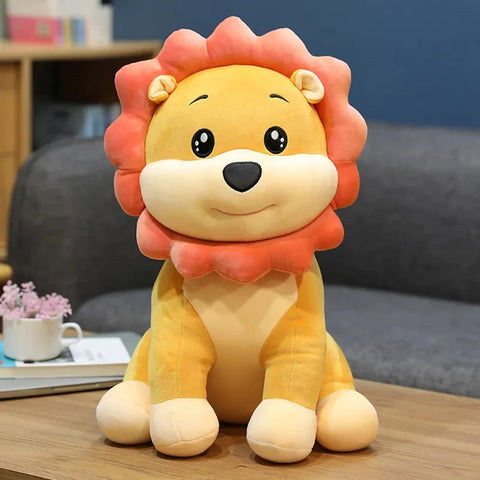 Sitting lion soft toy