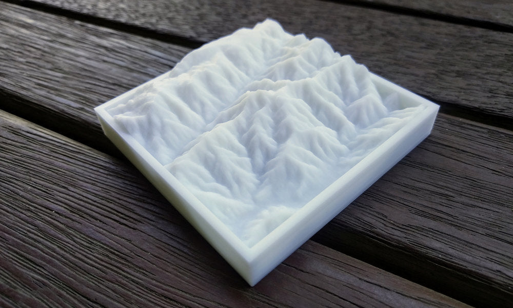 White 3D printed mountain range topography