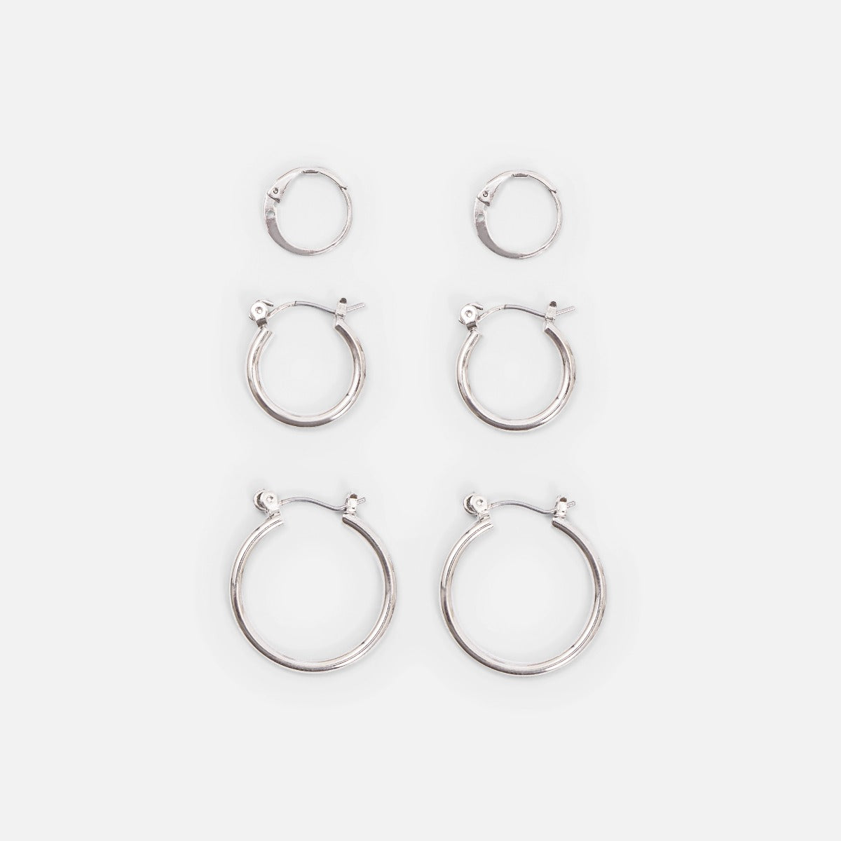 Silvered hoop earrings trio