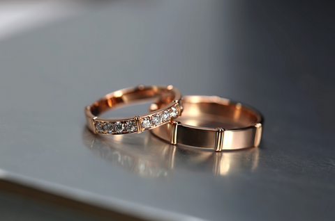 pair of gold engagement rings