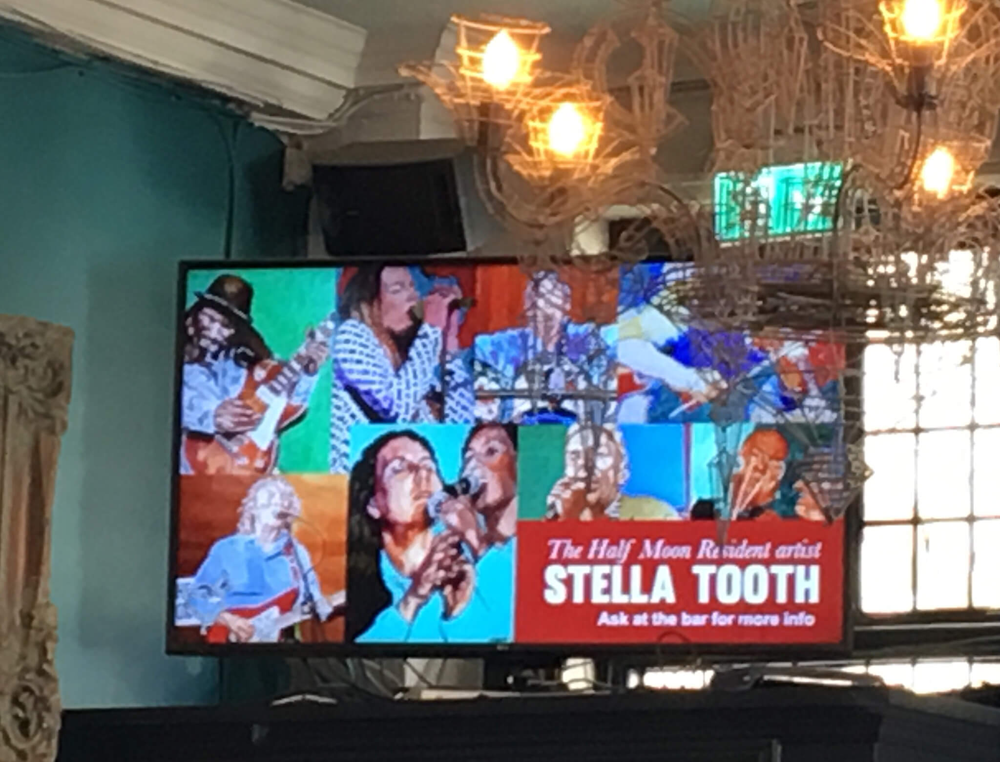 Big screen in Half Moon Putney with news of Stella Tooth as resident artist.