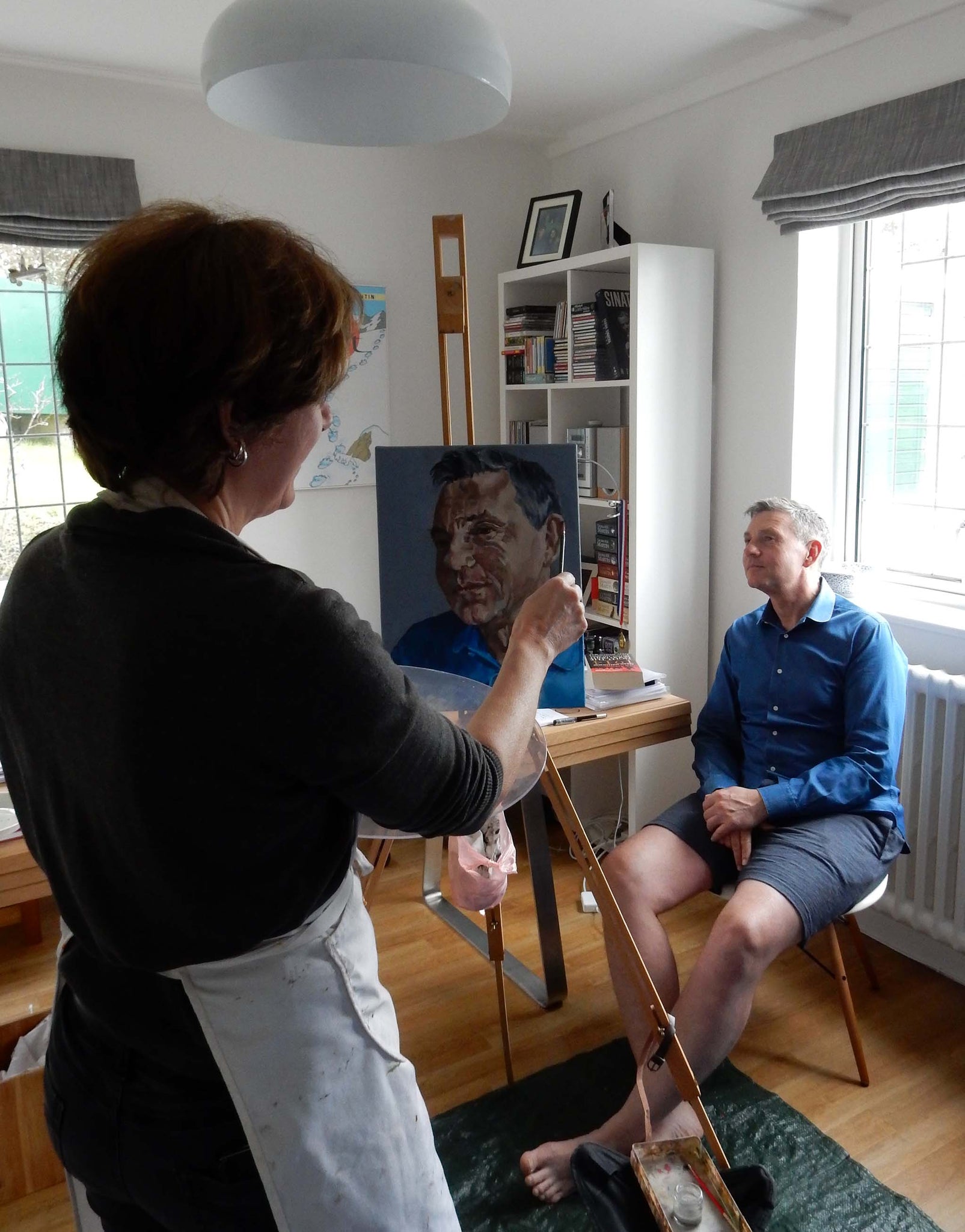 Stella Tooth painting a commissioned portrait of Martin Le Jeune in oils at his home.