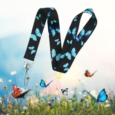 Teacher lanyard butterflies on grass background