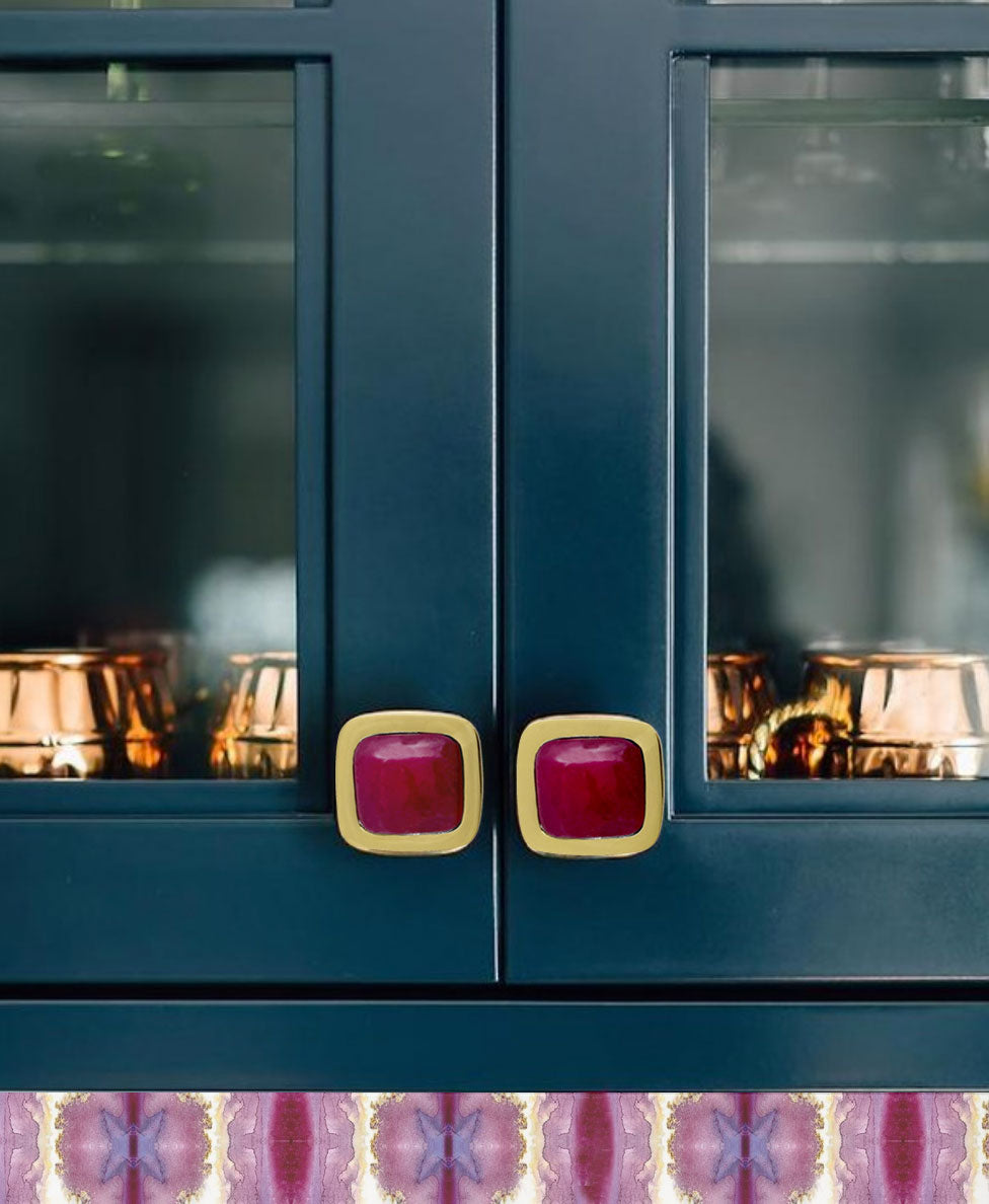 Benson Knobs in Brass and Pink Jade Used on Blue Wet Bar Cabinets