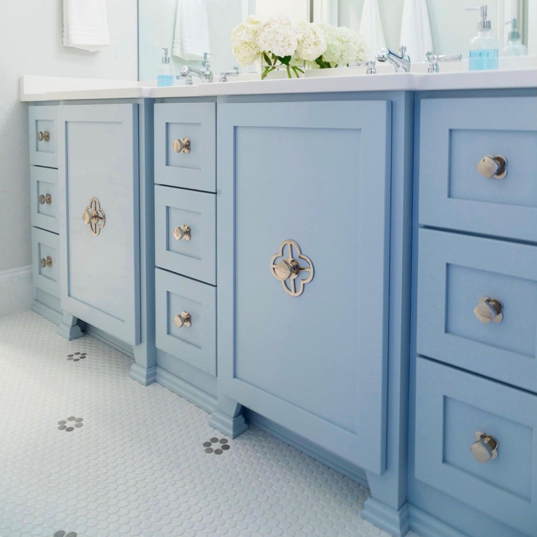 Sky Blue Bathroom Vanity with Floral Brass Backplates and Square Knobs in Polished Nickel