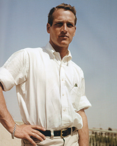 Paul Newman wearing an OCBD shirt with sunglassed in his chest pocket