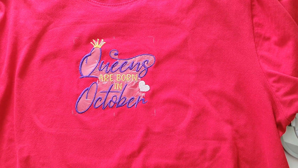 Finished embroidery design on a t-shirt, Queens are born in october