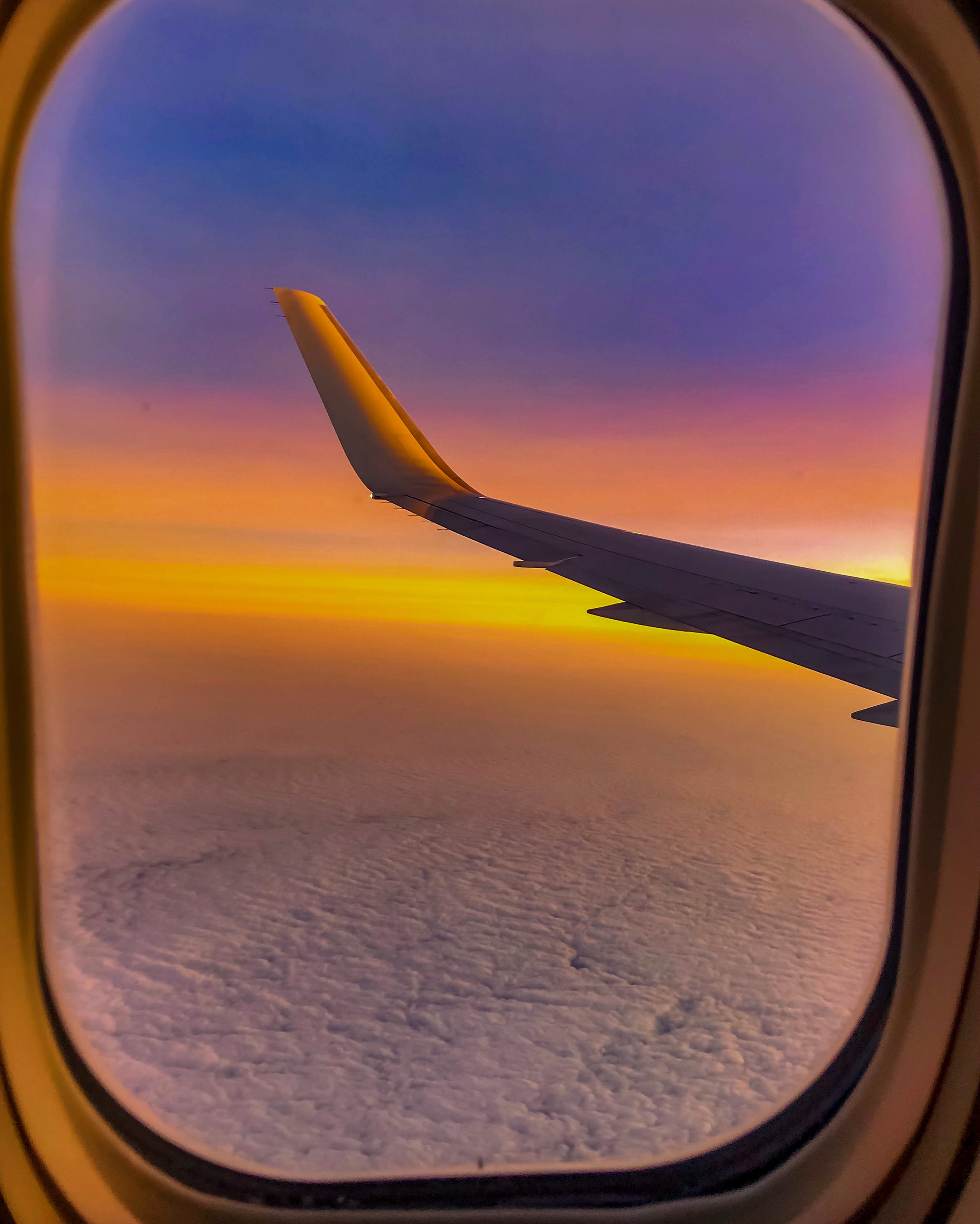 Fix Fly Travel sunrise view from an aircraft window