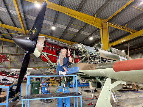 Georgia Henderson fixing an airplane becoming an aircraft maintenance engineer in Australia