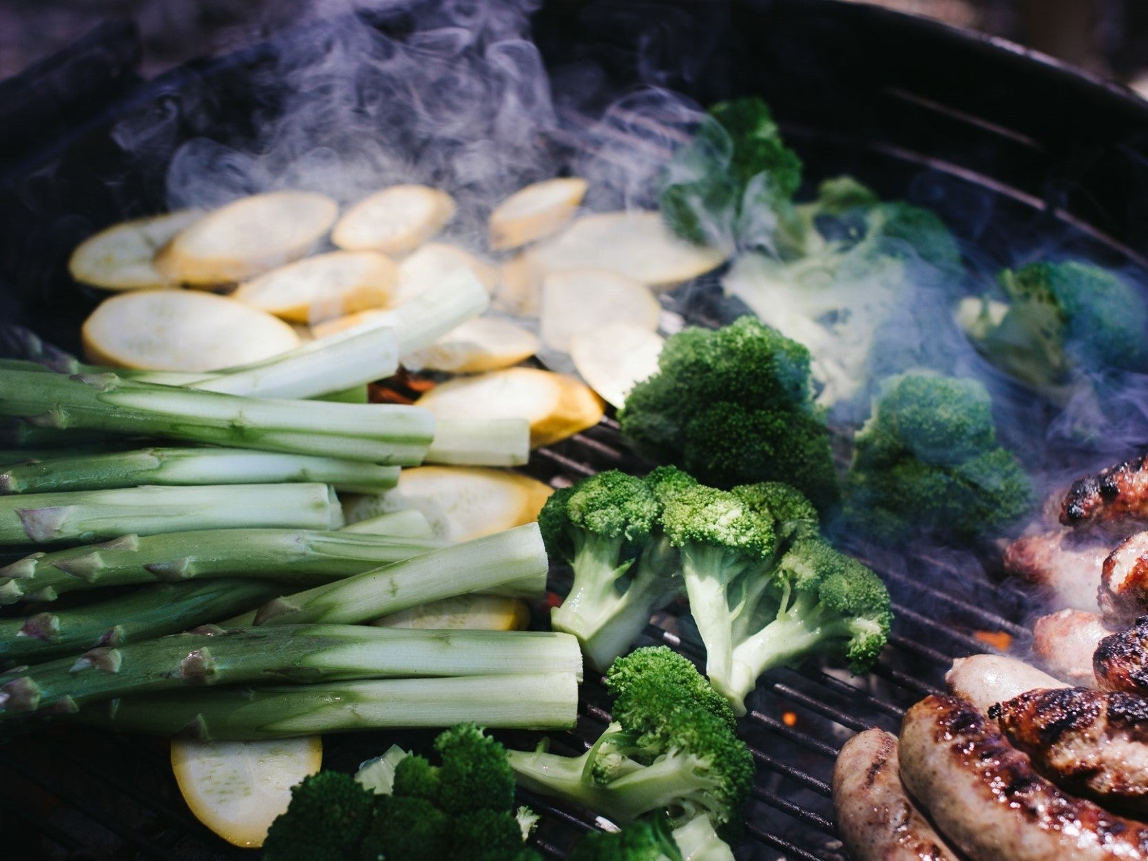 Healthy Grilling Organic Asparagus Yellow Summer Squash Bratwurst On The BBQ