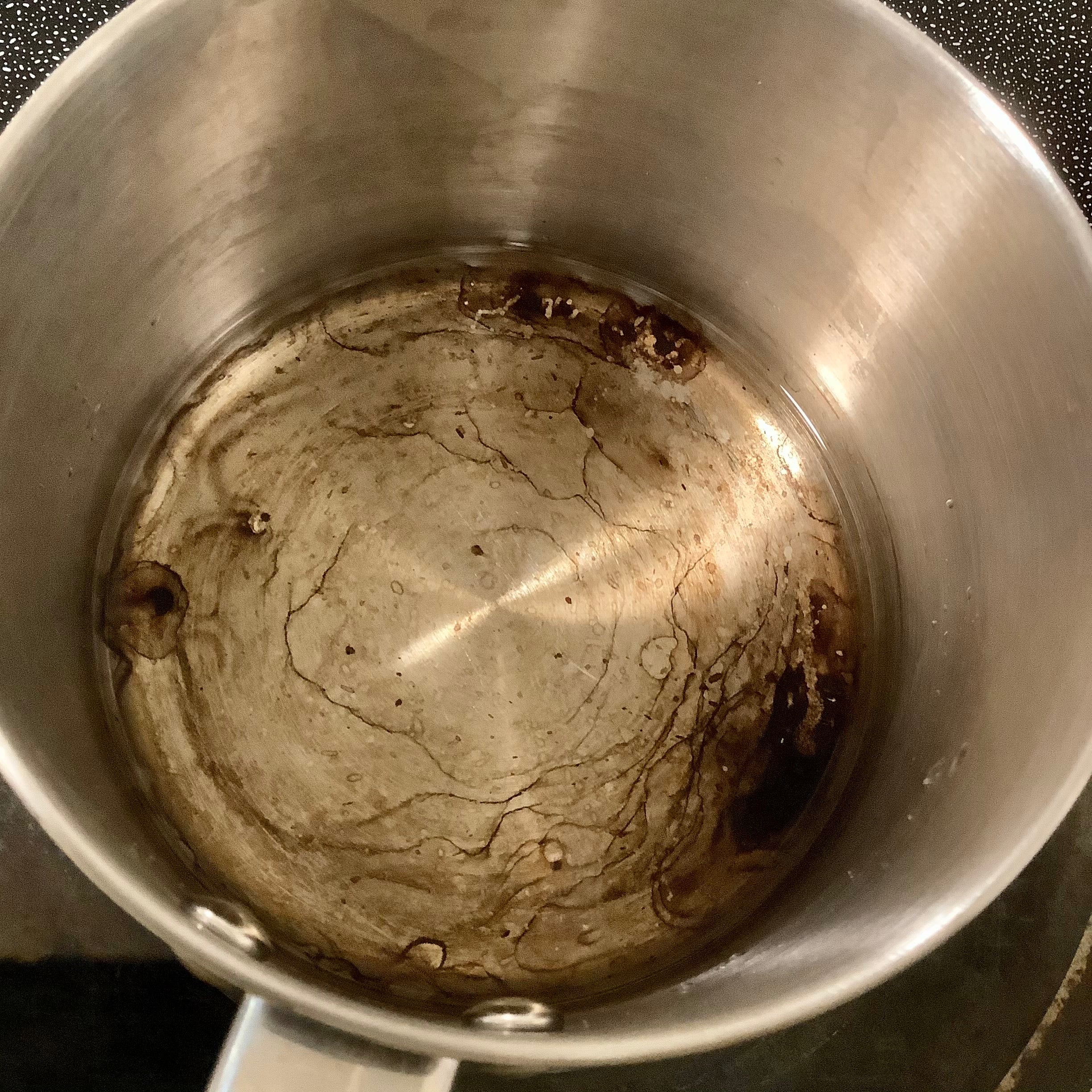 Stainless Steel Cooking Pot With Burnt Scorched Damage Before Cleaning