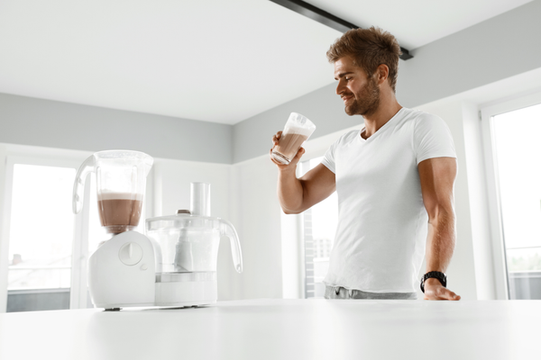 Man After An Exercise Workout Drinking Healthy Protein Smoothie Made With Organic Sacha Inchi Protein Powder