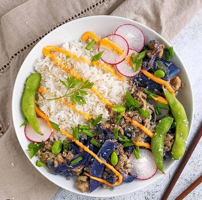 Egg Roll in a Bowl From Overhead with Radish Garnishes and Jasmine Rice