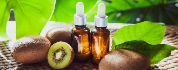 essential oil bottles with kiwis