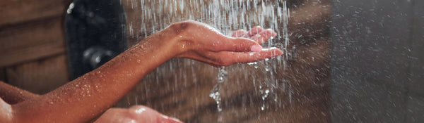 female hands in shower