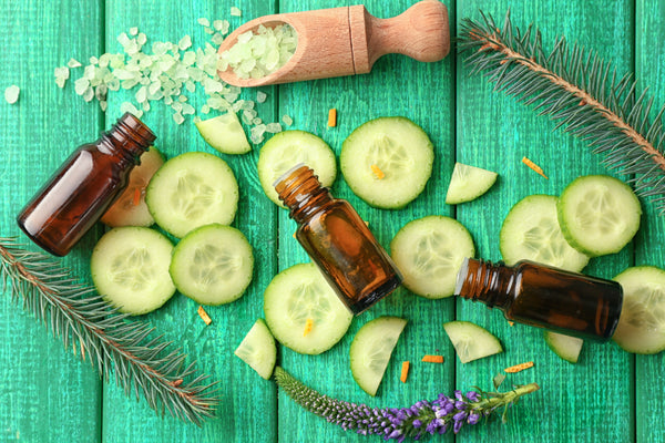 cucumbers and oil bottles