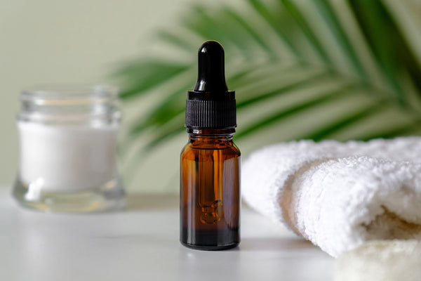 essential oil bottle with towel