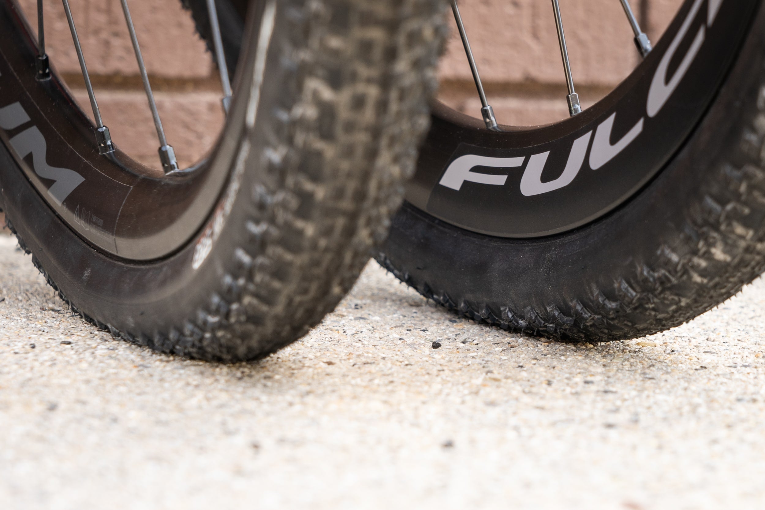 a close up shot of the tread on mountain bike tires