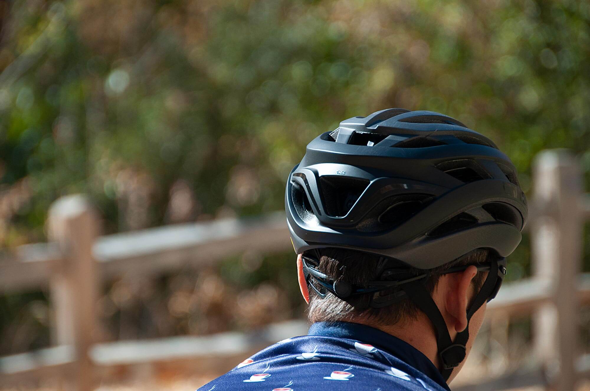 a man wearing the Giro Helios Spherical Helmet